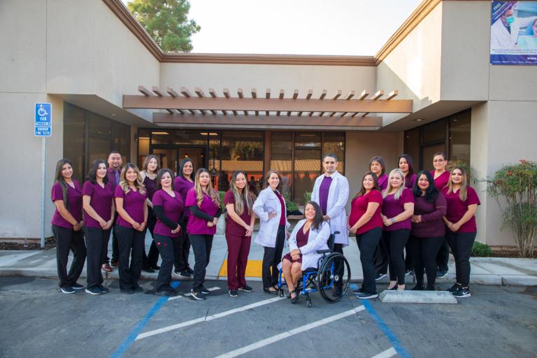 UHC Staff in front of Health Center