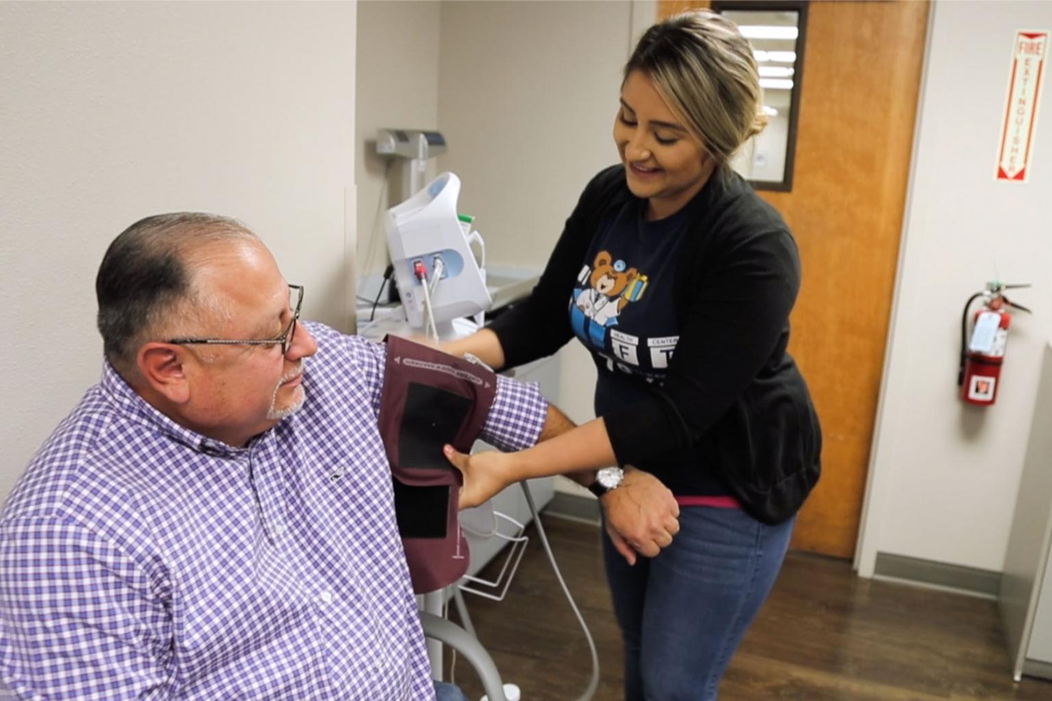 Patient having their vitals taken 